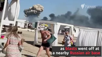 Panicked holidaymakers flee Crimea beach | SBS News