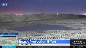 Long Beach crews work to protect beaches during storm