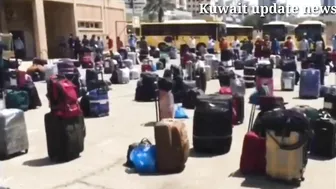 Kuwait workers fingers print and block travel news