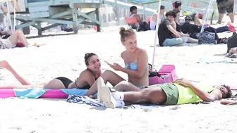 Sitting on Peoples Beach Towels!