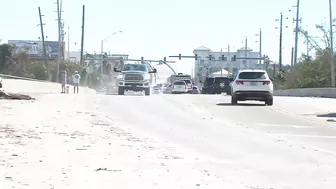 Beach businesses begin to clear out in order to rebuild