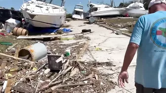 Fort Myers Beach residents leaving the island on foot