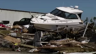 Fort Myers Beach residents leaving the island on foot