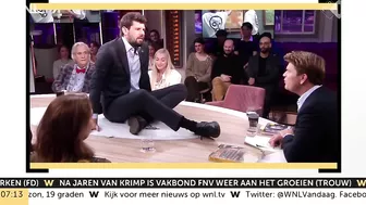 Klimaatactivist lijmt zich live op tv vast aan talkshowtafel Jinek