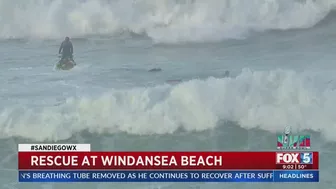 Lifeguards Rescue Surfers At Windansea Beach