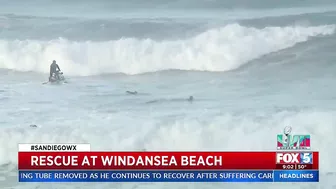 Lifeguards Rescue Surfers At Windansea Beach