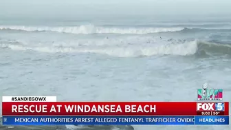 Lifeguards Rescue Surfers At Windansea Beach