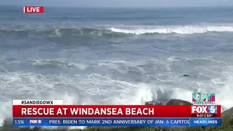 Lifeguards Rescue Surfers At Windansea Beach