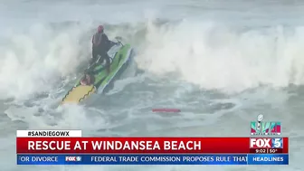 Lifeguards Rescue Surfers At Windansea Beach