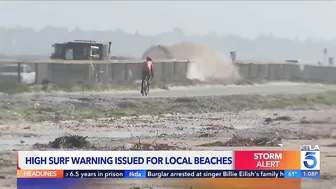 Video: Huntington Beach bicyclist swamped by spray from CalTrans truck