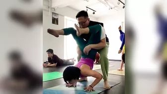 Yoga trainer helping girl in exercise for her flexible body #yoga #exercise #workout #gym #trainer