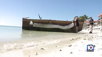 Migrants come ashore Tuesday morning in Key Colony Beach