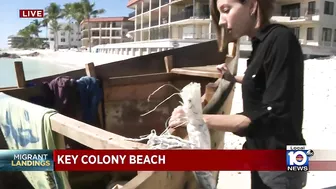 Migrants come ashore Tuesday morning in Key Colony Beach