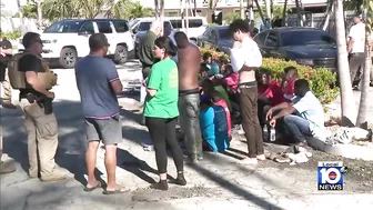 Migrants come ashore Tuesday morning in Key Colony Beach