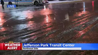 Commuters continuing routine travel as snow falls across Chicago