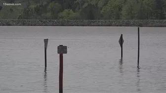 Lake Tobesofkee workers open dam and clean up beach