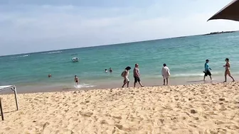 El Portus, Spain 2023. Beach walk along crowded beach