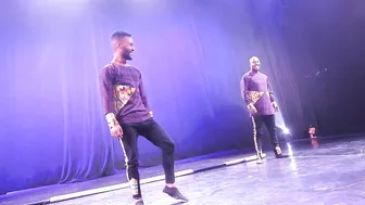 Acrobats performing on a flexible beam.