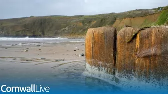 Storms uncover 200-year-old mine shaft entrance on Cornwall beach