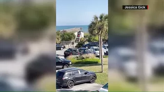 Video shows people running after shooting on South Carolina beach