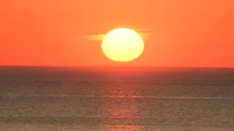 Watch the sunrise from Chicago's North Avenue Beach