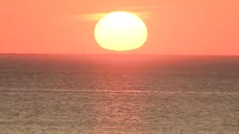 Watch the sunrise from Chicago's North Avenue Beach