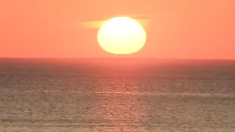 Watch the sunrise from Chicago's North Avenue Beach