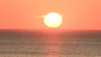 Watch the sunrise from Chicago's North Avenue Beach