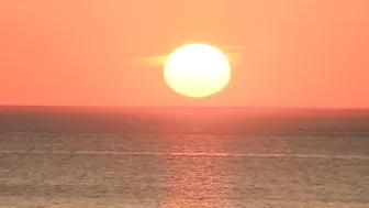 Watch the sunrise from Chicago's North Avenue Beach