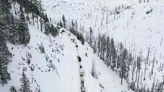 Mid-April snow makes for slick mountain travel; spin-outs, jackknifed semi close Hwys