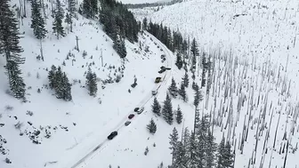 Mid-April snow makes for slick mountain travel; spin-outs, jackknifed semi close Hwys