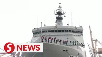 Need a ride? Indonesians travel home for Eid on warship