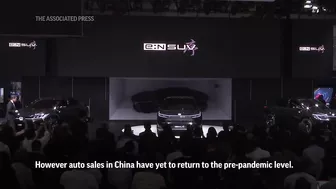 Car brands unveil new models at China show