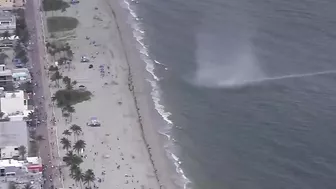 Waterspout sends people scrambling on Hollywood Beach in Florida