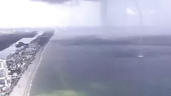 Waterspout sends people scrambling on Hollywood Beach in Florida