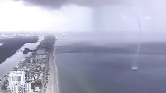 Waterspout sends people scrambling on Hollywood Beach in Florida