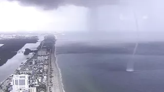 Waterspout sends people scrambling on Hollywood Beach in Florida