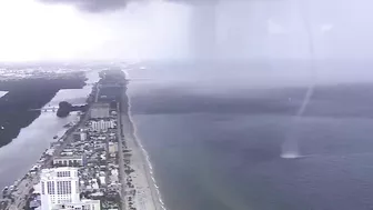 Waterspout sends people scrambling on Hollywood Beach in Florida