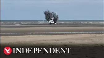 Moment British WWII bomb is detonated on Belgian beach