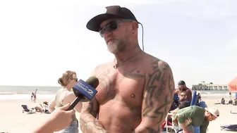 Surfers gather on Folly Beach to honor late bride