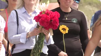 Surfers gather on Folly Beach to honor late bride