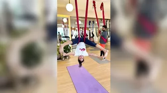 Aerial yoga - trying those splits ????