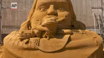 Fairy tale sand sculptures emerge from Danish beach