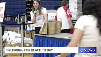 Beach To Bay director gives last minute reminders to participants before big relay