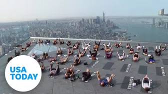 New York City fitness class brings yoga up 100 stories in the air | USA TODAY