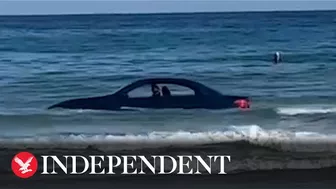 BMW washed out to sea on Cornish beach rescued by coastguard