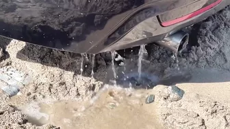 BMW washed out to sea on Cornish beach rescued by coastguard