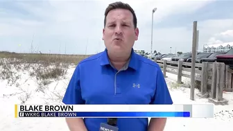 WATCH: Sharks come close to shore in Orange Beach