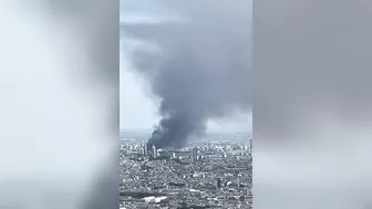 Warehouse fire releases smoke seen from the Eiffel Tower in Paris