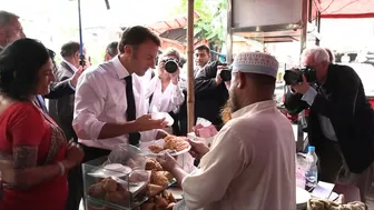 France's Macron samples local food in Bangladesh, takes boat trip | AFP